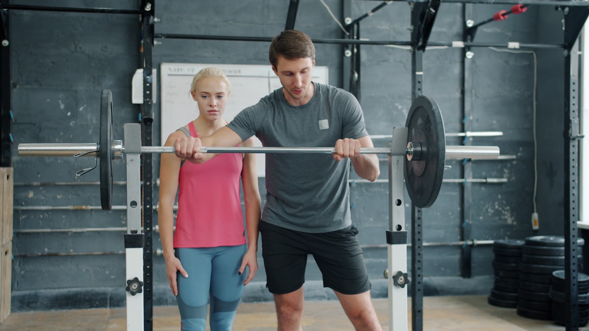 Person lifting weights at a gym